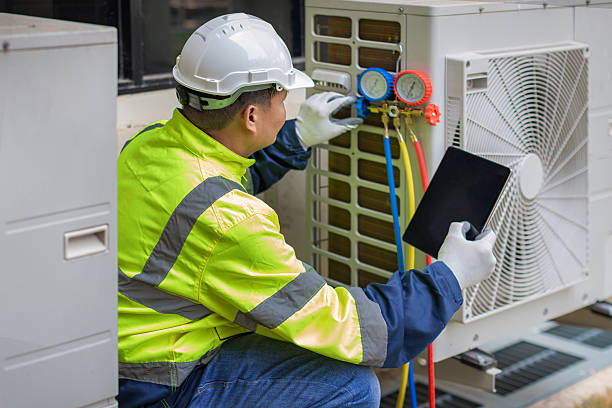 Professional Ductwork Repair technician working in Kingston, MA